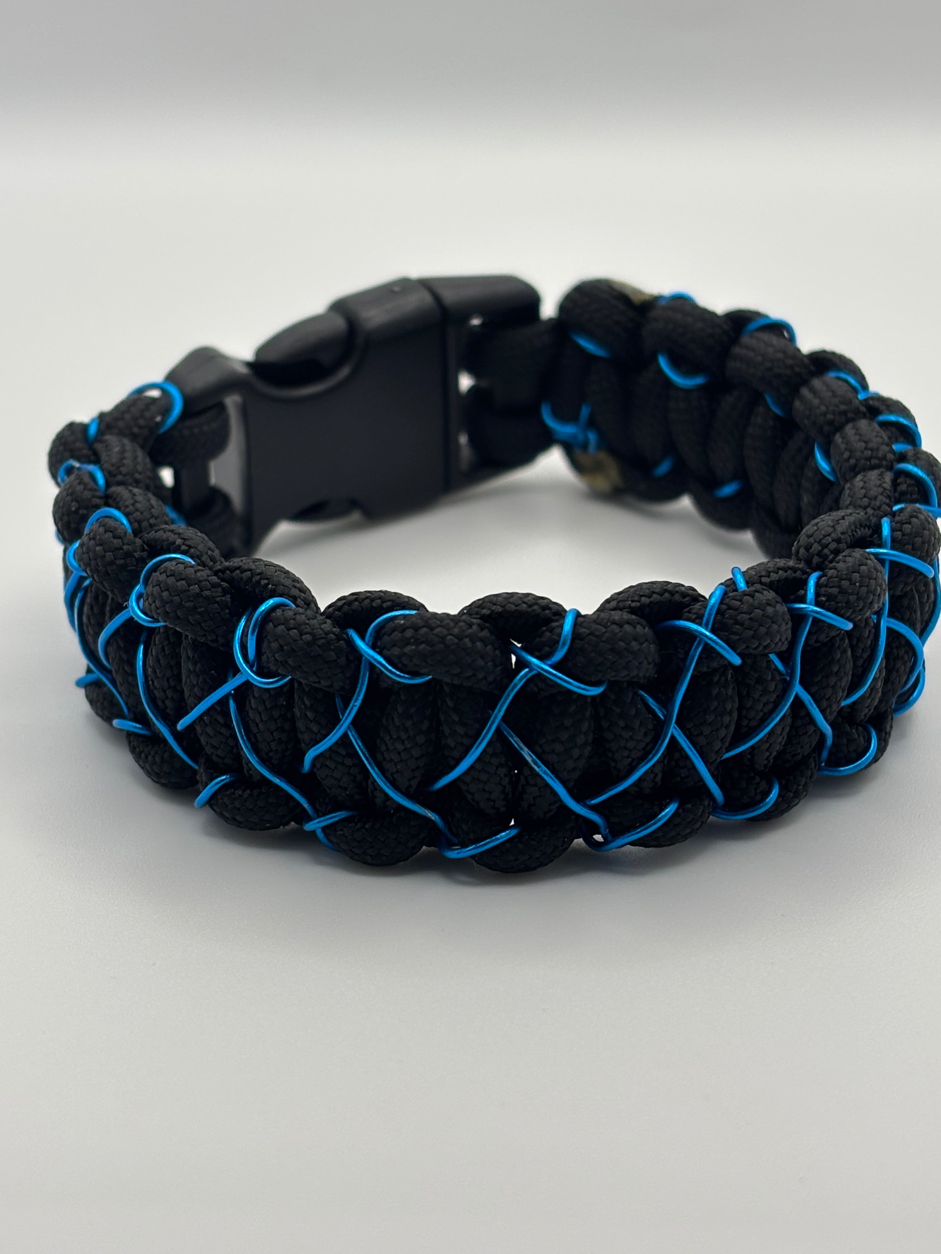 Handmade Cobra Knot Paracord Bracelet – Black with Blue Metal  Stitched Accent image 0