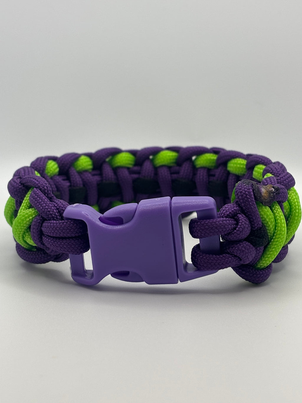 Handmade Crisscrossed Paracord Bracelet – Purple, Black & Neon Green image 1
