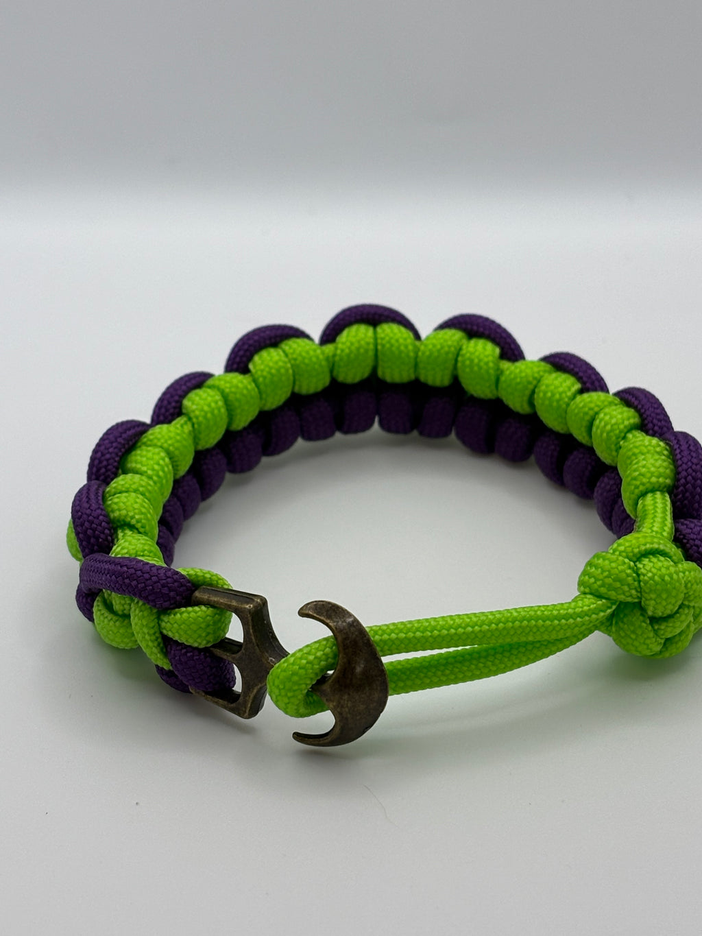 Handmade Half Hitch Knot Paracord Bracelet – Neon Green & Purple with Bronze Anc image 1