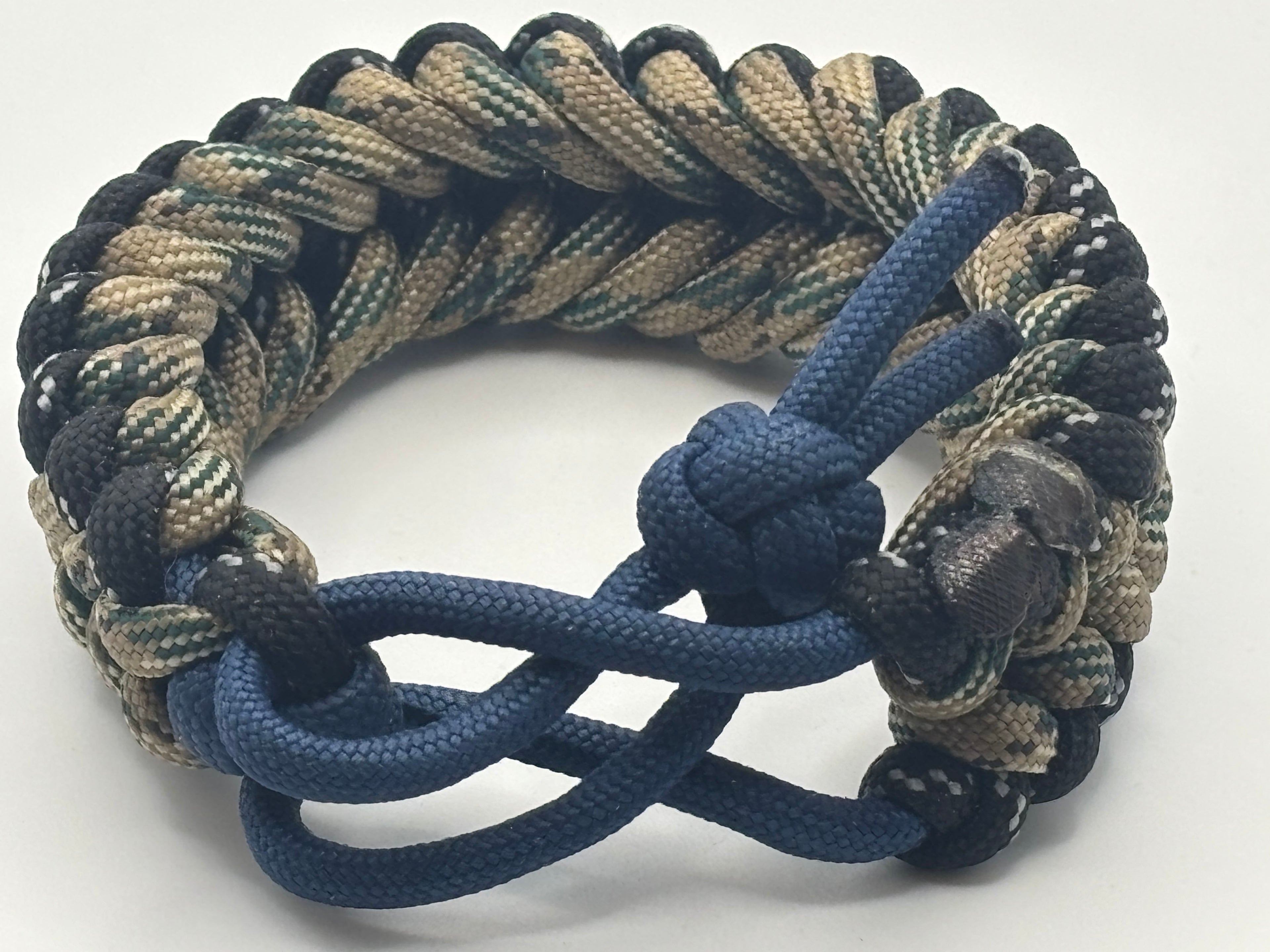 Handmade Grin of a Wolf Paracord Bracelet (Tan/Blue) image 1