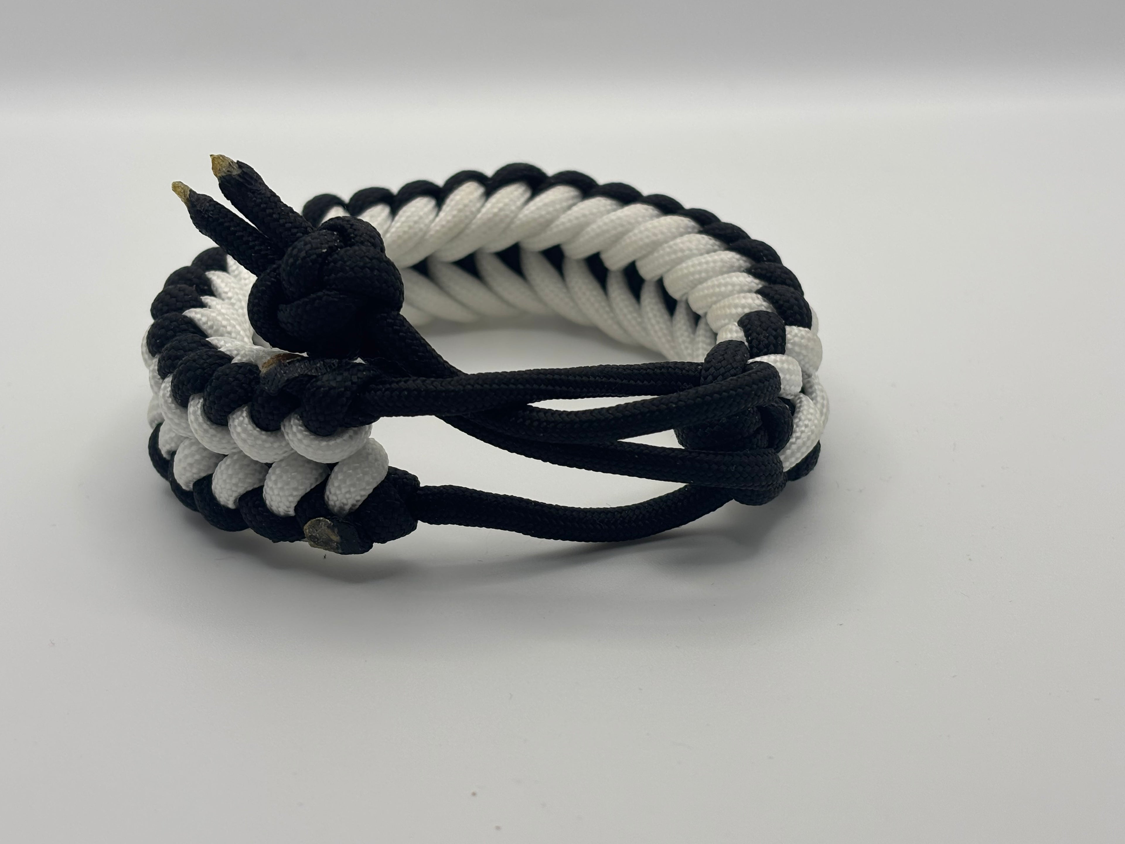 Handmade Grin of a Wolf Paracord Bracelet (Black/White) image 2