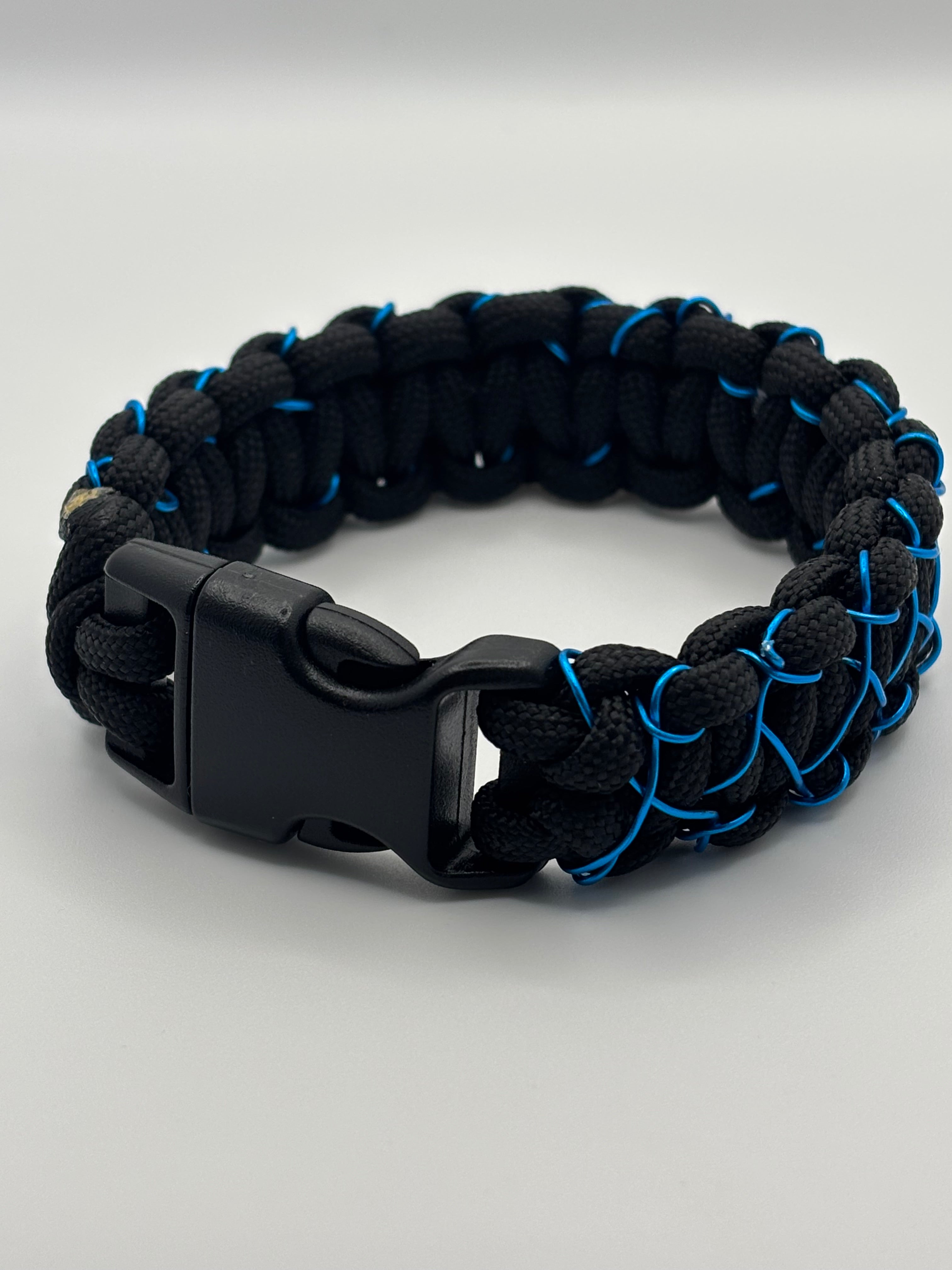 Handmade Cobra Knot Paracord Bracelet – Black with Blue Metal  Stitched Accent image 1